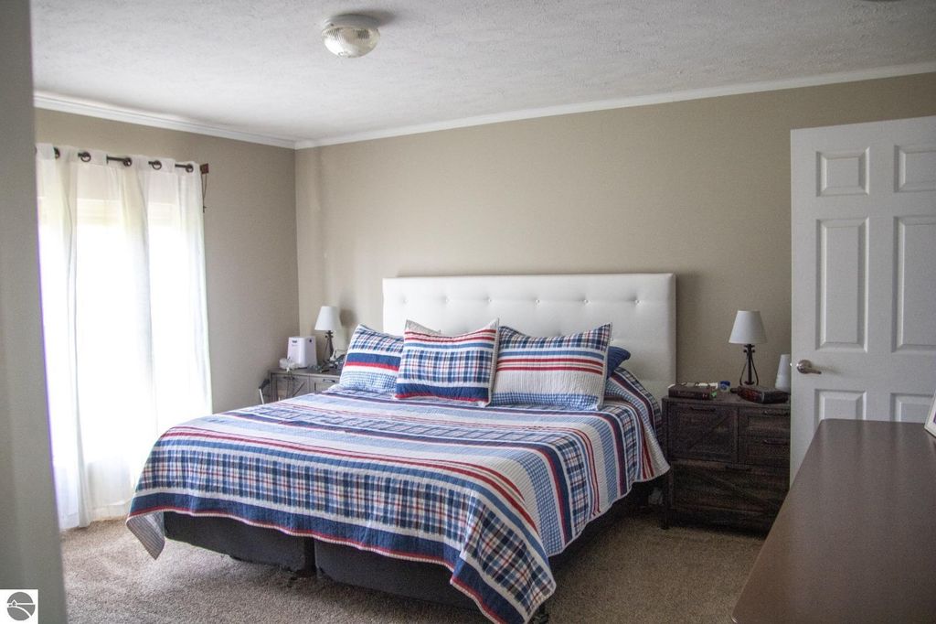 Image 17 of property listing at 5557 E Pleasant Valley Road, Shepherd, MI 48883