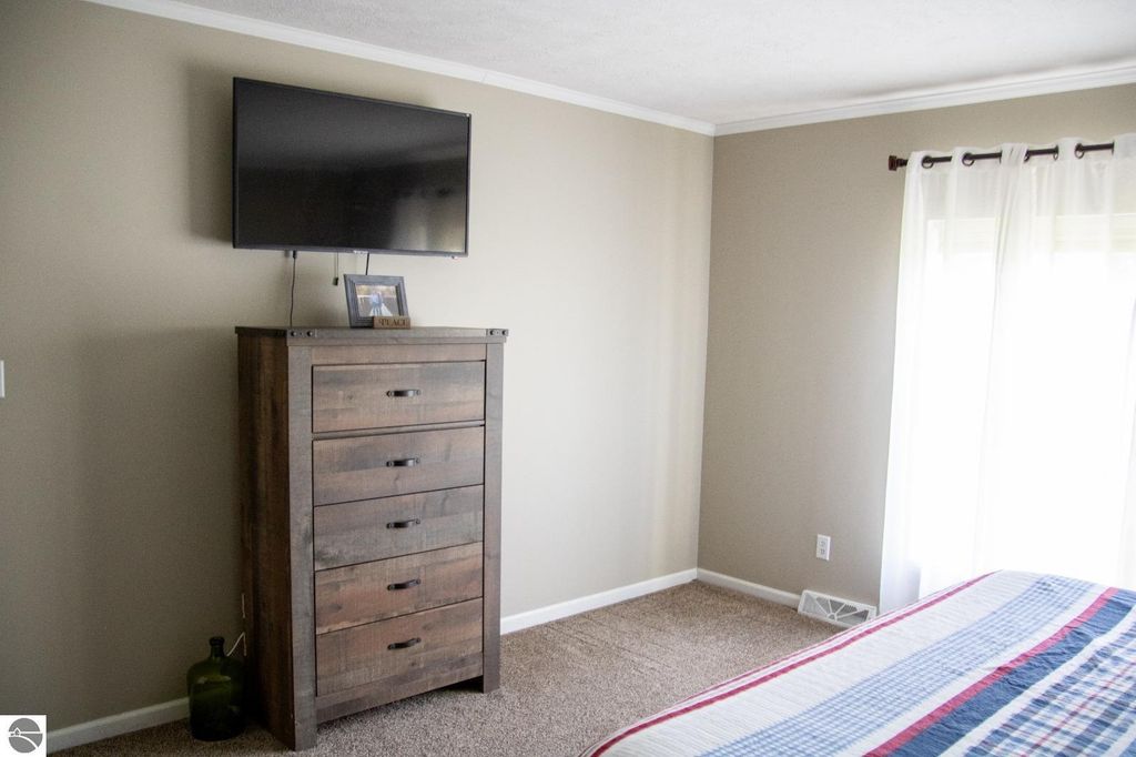 Image 19 of property listing at 5557 E Pleasant Valley Road, Shepherd, MI 48883