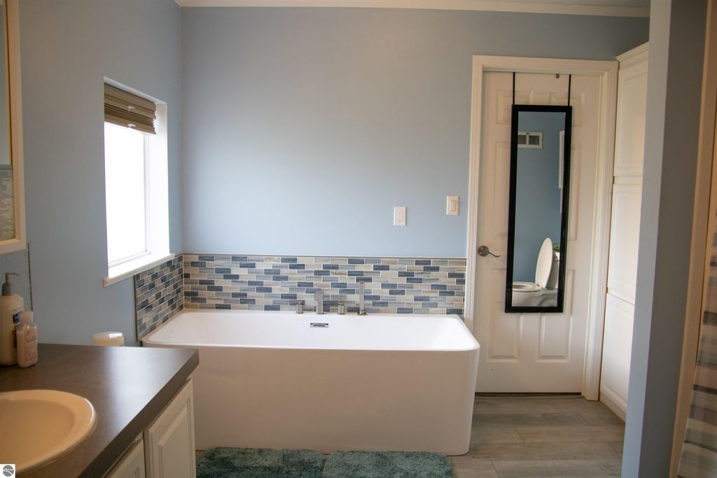 Image 21 of property listing at 5557 E Pleasant Valley Road, Shepherd, MI 48883