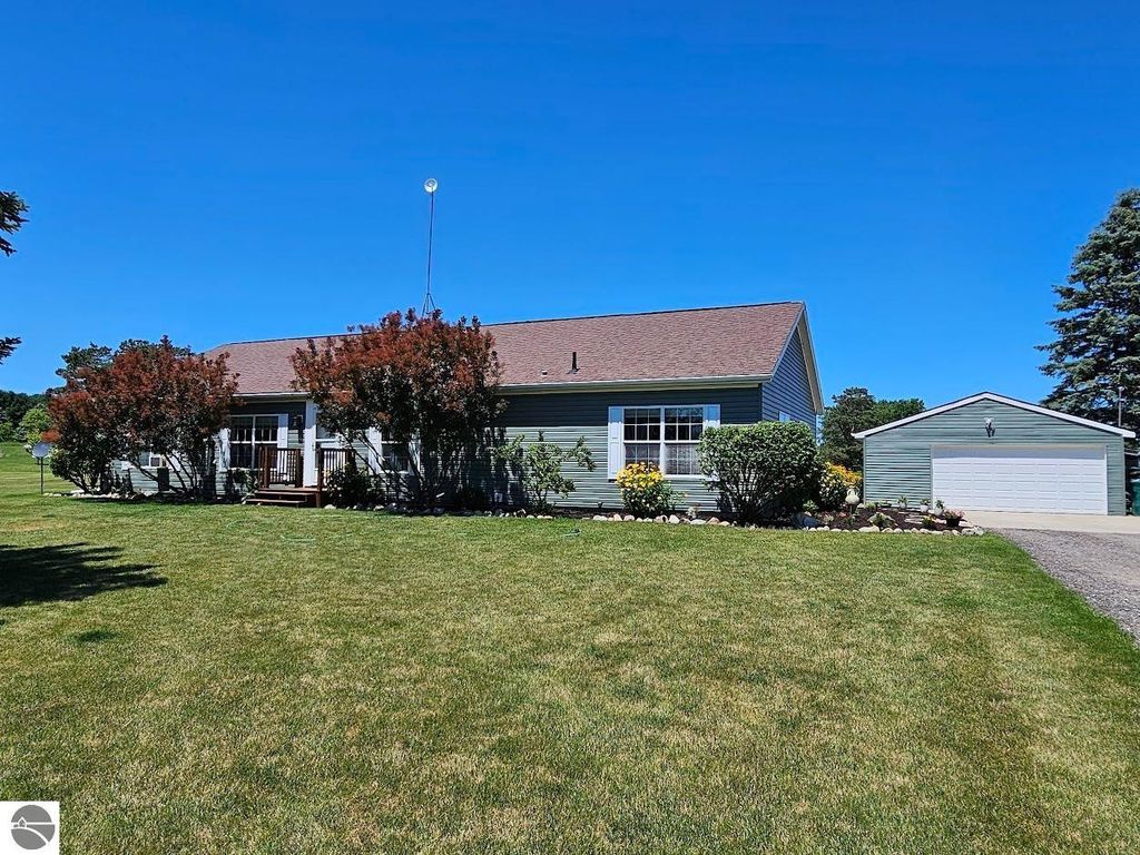 Image 3 of property listing at 5557 E Pleasant Valley Road, Shepherd, MI 48883