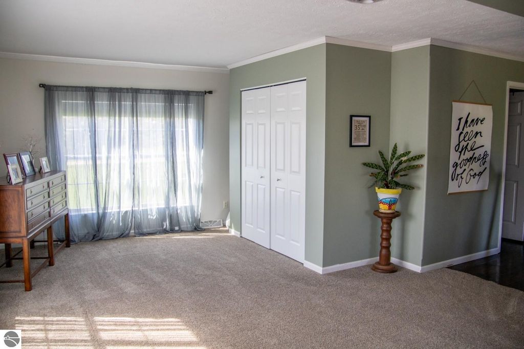 Image 32 of property listing at 5557 E Pleasant Valley Road, Shepherd, MI 48883