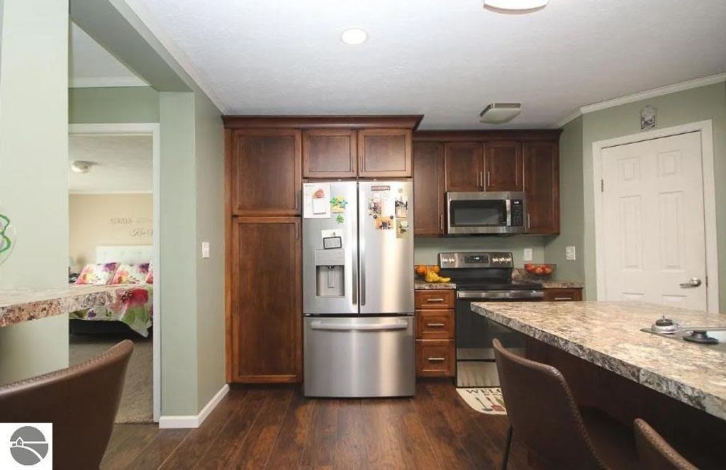 Image 9 of property listing at 5557 E Pleasant Valley Road, Shepherd, MI 48883