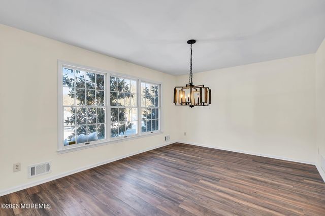 8 Winding Woods Way, Manalapan, NJ 07726