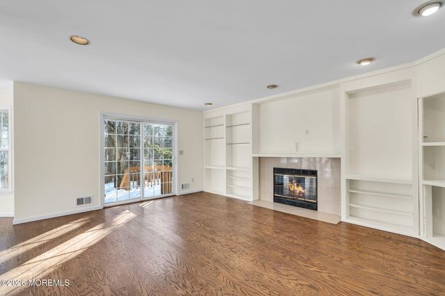 8 Winding Woods Way, Manalapan, NJ 07726