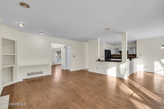 8 Winding Woods Way, Manalapan, NJ 07726