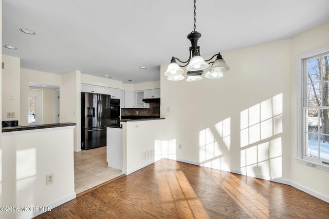 8 Winding Woods Way, Manalapan, NJ 07726