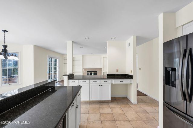 8 Winding Woods Way, Manalapan, NJ 07726