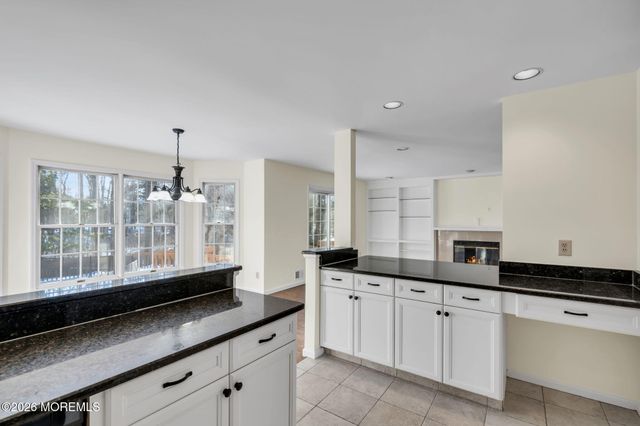 8 Winding Woods Way, Manalapan, NJ 07726