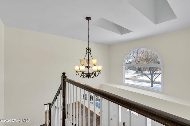 8 Winding Woods Way, Manalapan, NJ 07726