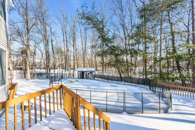 8 Winding Woods Way, Manalapan, NJ 07726