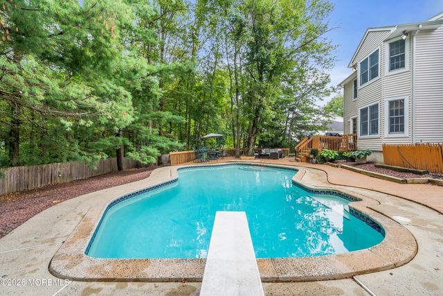 8 Winding Woods Way, Manalapan, NJ 07726