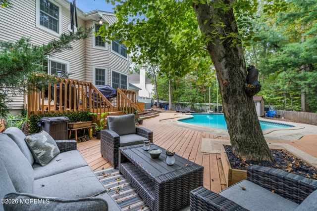 8 Winding Woods Way, Manalapan, NJ 07726