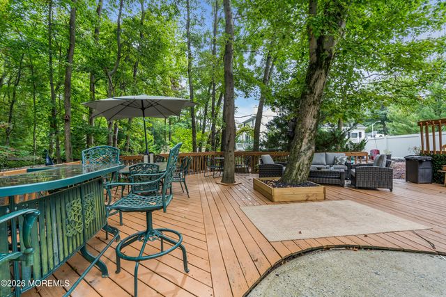 8 Winding Woods Way, Manalapan, NJ 07726