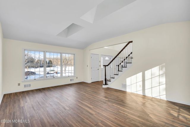 8 Winding Woods Way, Manalapan, NJ 07726