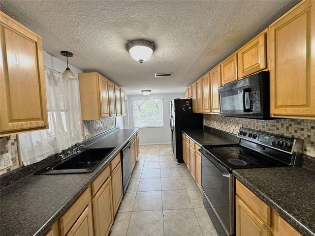 1345 BASSWOOD DRIVE, Holiday, FL 34690