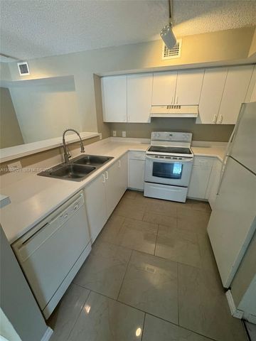 111 Yacht Club Way 107, Hypoluxo, FL 33462