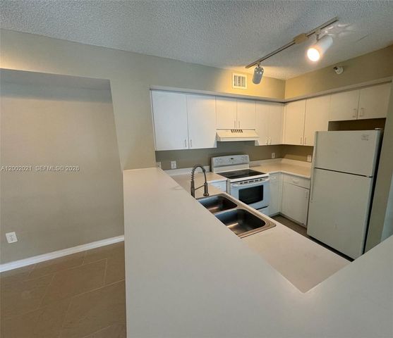 111 Yacht Club Way 107, Hypoluxo, FL 33462