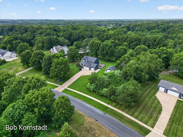 8059 Buttrick Ridge Trail, Alto, MI 49302