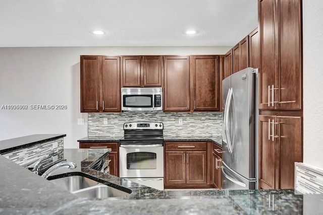 4749 N Grand Cypress Cir N, Coconut Creek, FL 33073