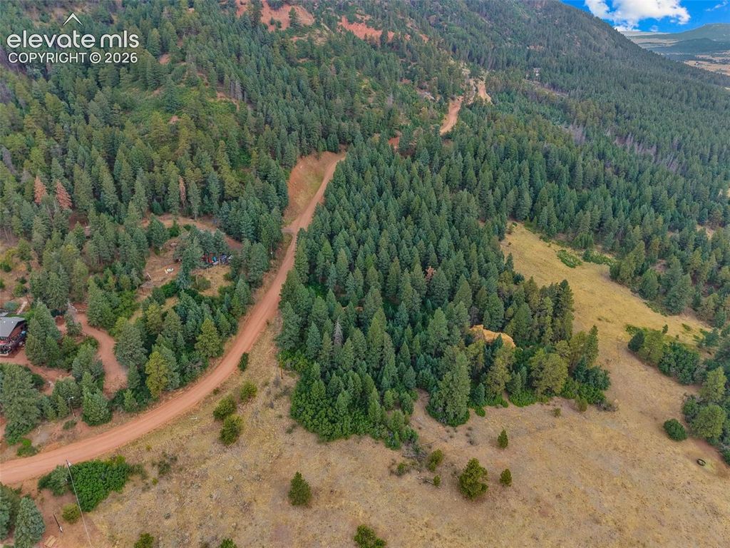 13665 Woodmoor West Drive, Larkspur, CO 80118 — exterior