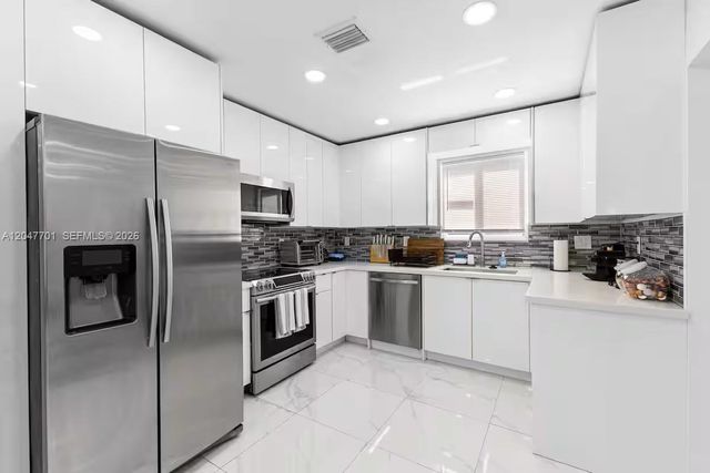 1240 NE 159th Street, North Miami Beach, FL 33162