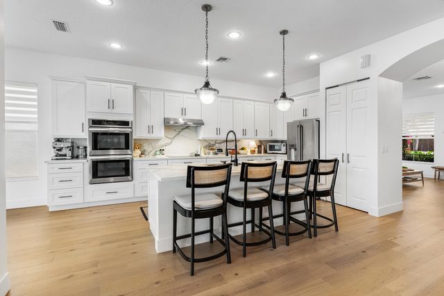 9009 New Hope Court, Royal Palm Beach, FL 33411