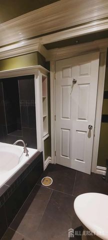 106 Maryknoll Route, Menlo Park Terrace, NJ 08840