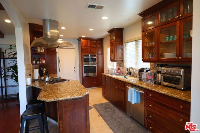 4561 Don Felipe Drive, Los Angeles, CA 90008