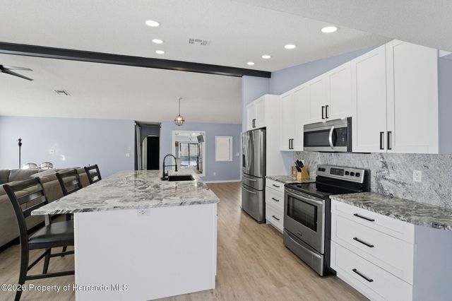 12473 Spreading Oak Drive, Spring Hill, FL 34609