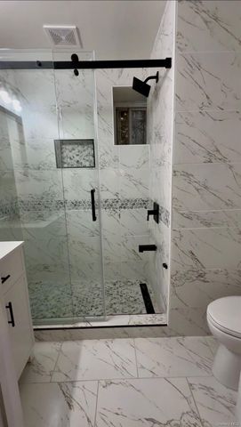 8470 159th Street, Jamaica Hills, NY 11432