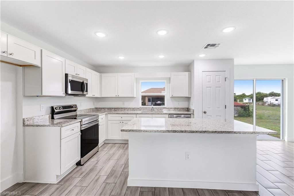 1242 Echard ST E, LEHIGH ACRES, FL 33974 — photo 4