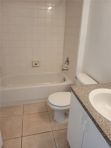 5005 Wiles Road 108, Coconut Creek, FL 33073