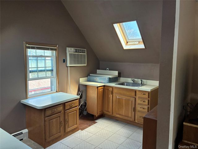 21 Wellington Place, Amityville, NY 11701