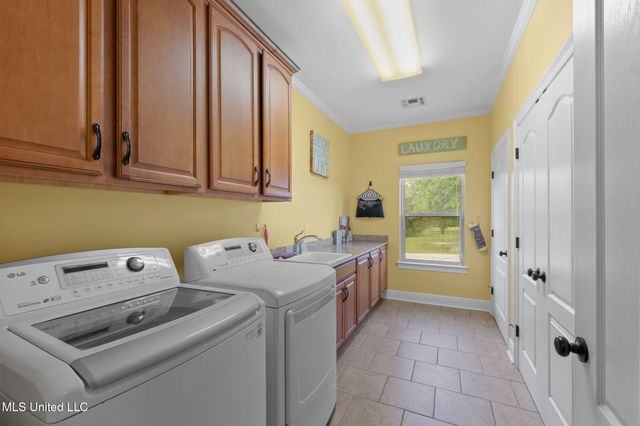 8185 Ridgewood Drive, Kiln, MS 39556