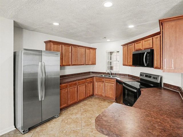 2405 SW HASSONITE STREET, Kissimmee, FL 34744