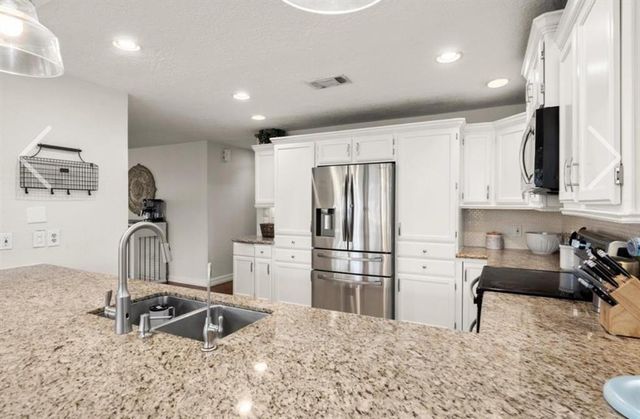 99 April Wind Dr N, Conroe, TX 77356