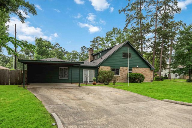 203 Wedgewood Court, Oak Ridge North, TX 77386