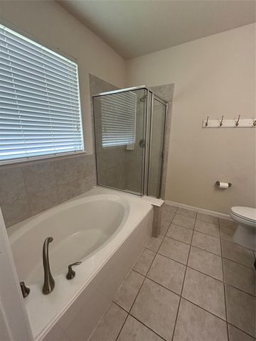 2217 Pine Creek Court, Conroe, TX 77301