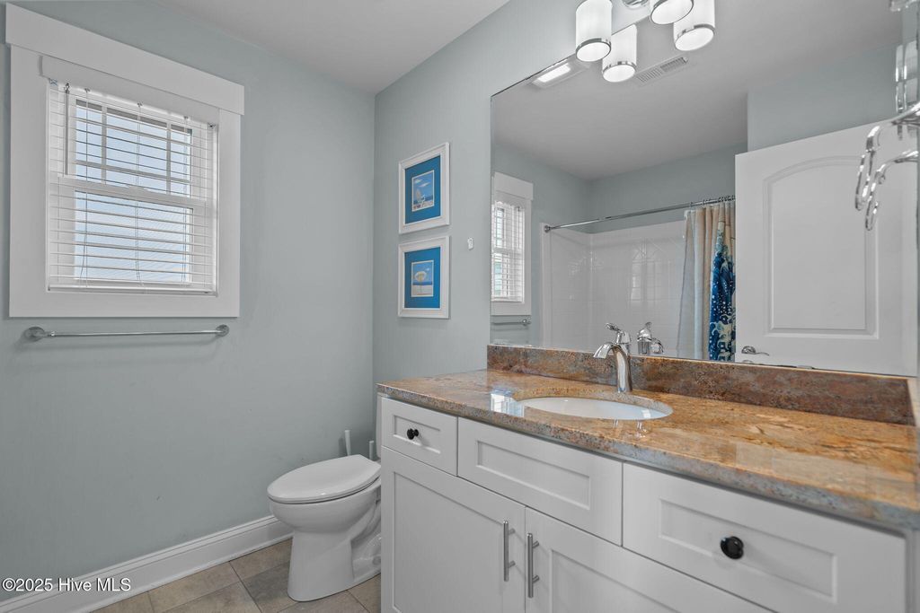 Image 29 of property listing at 1914 E Dolphin Drive, Oak Island, NC 28465