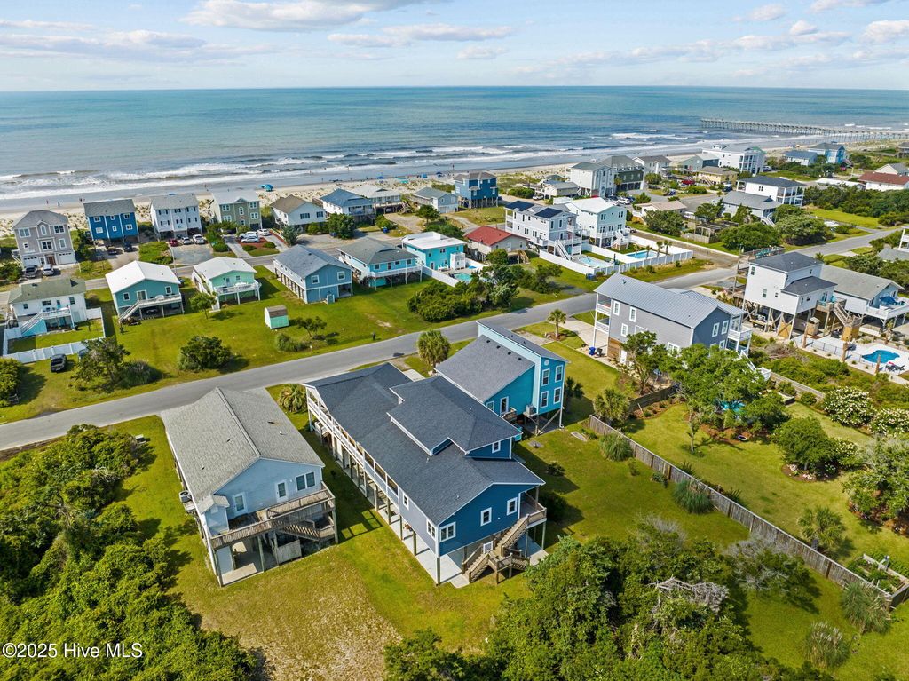 Image 3 of property listing at 1914 E Dolphin Drive, Oak Island, NC 28465