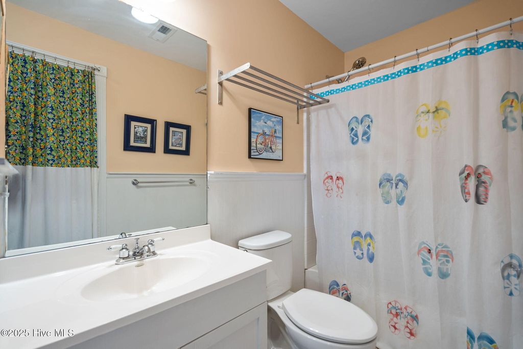 Image 45 of property listing at 1914 E Dolphin Drive, Oak Island, NC 28465