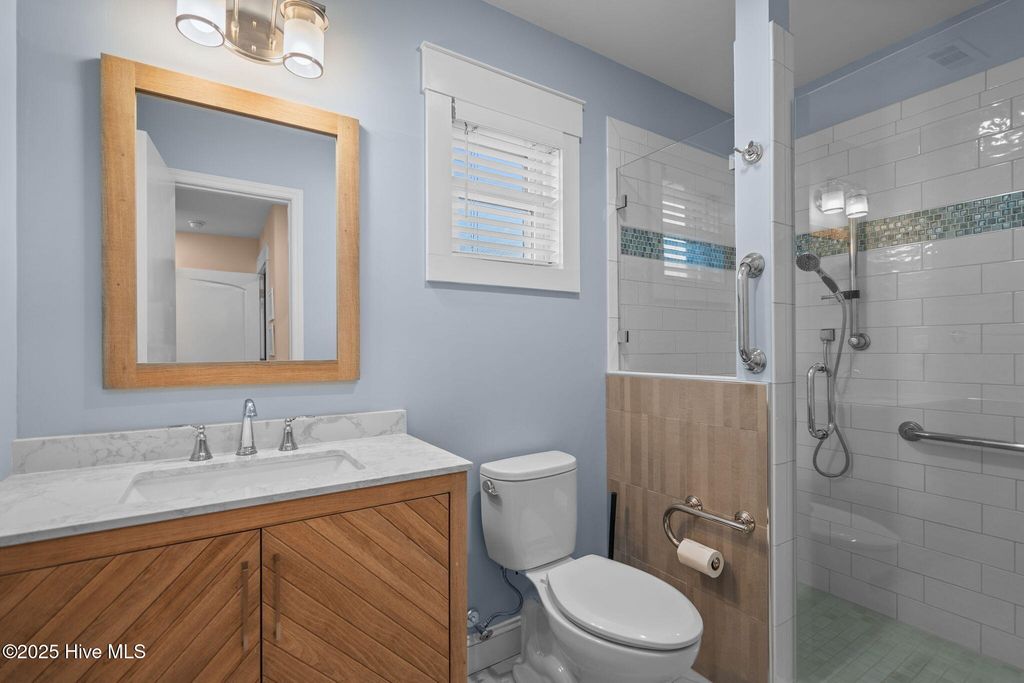 Image 49 of property listing at 1914 E Dolphin Drive, Oak Island, NC 28465