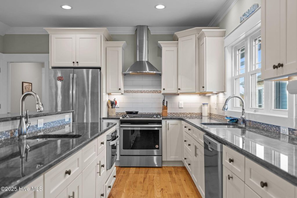 Image 5 of property listing at 1914 E Dolphin Drive, Oak Island, NC 28465