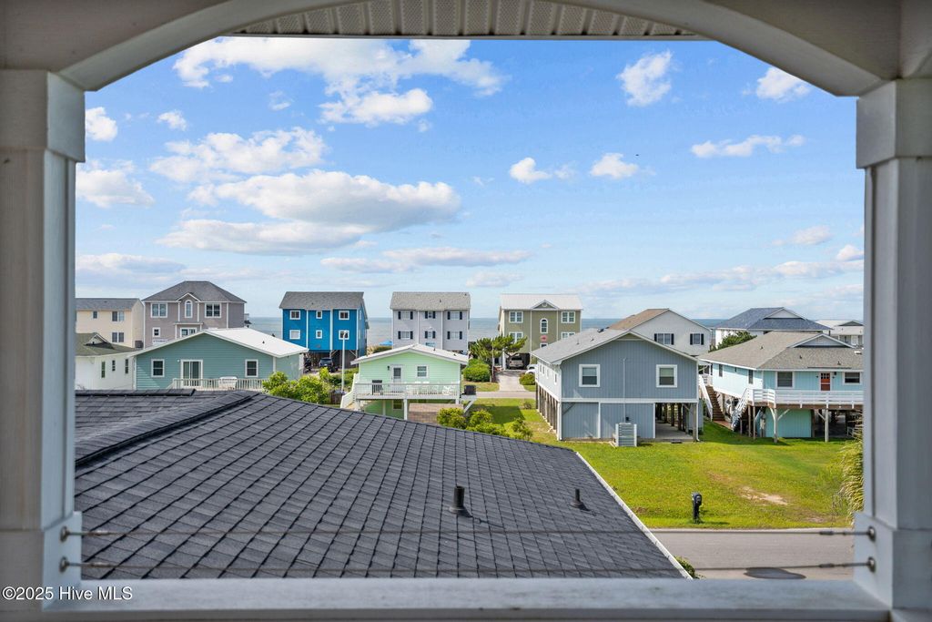 Image 61 of property listing at 1914 E Dolphin Drive, Oak Island, NC 28465