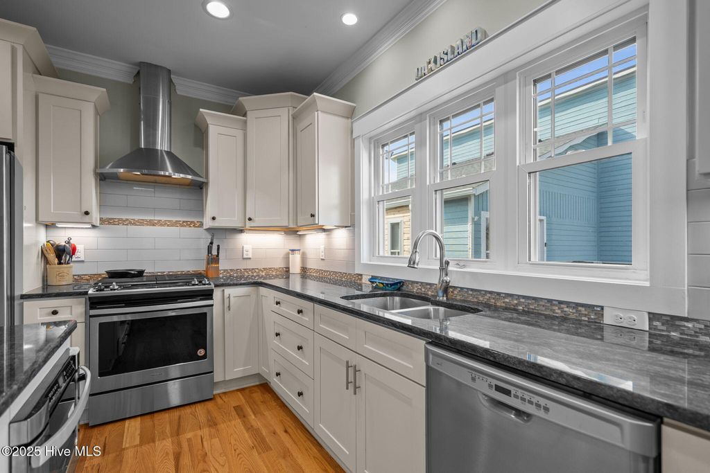 Image 8 of property listing at 1914 E Dolphin Drive, Oak Island, NC 28465