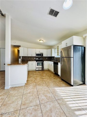 3313 14th ST SW, Lehigh Acres, FL 33976