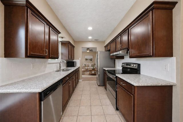 9418 Kilrenny Drive, Spring, TX 77379