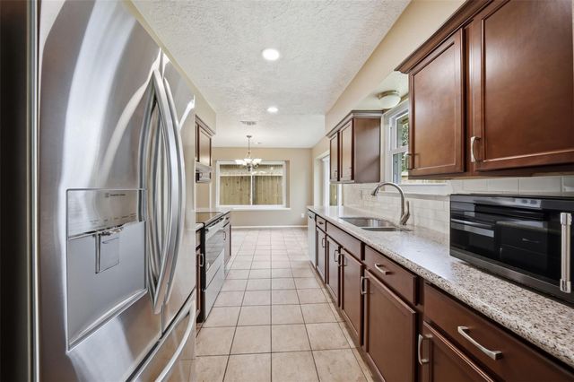 9418 Kilrenny Drive, Spring, TX 77379