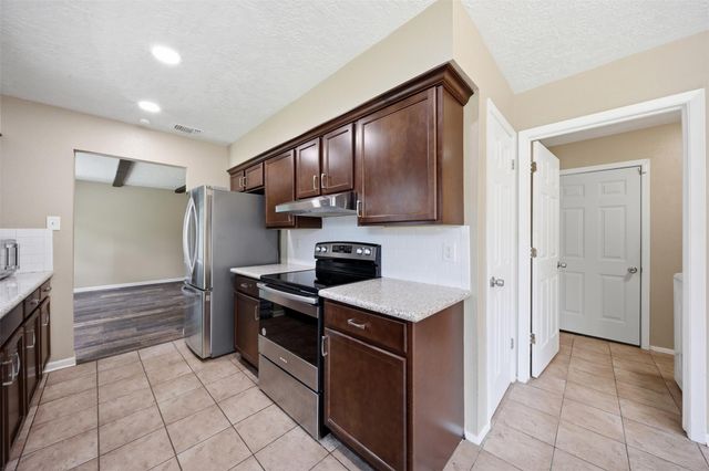 9418 Kilrenny Drive, Spring, TX 77379