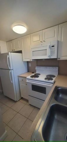 1501 CRESCENT CIR E-46, Lake Park, FL 33403